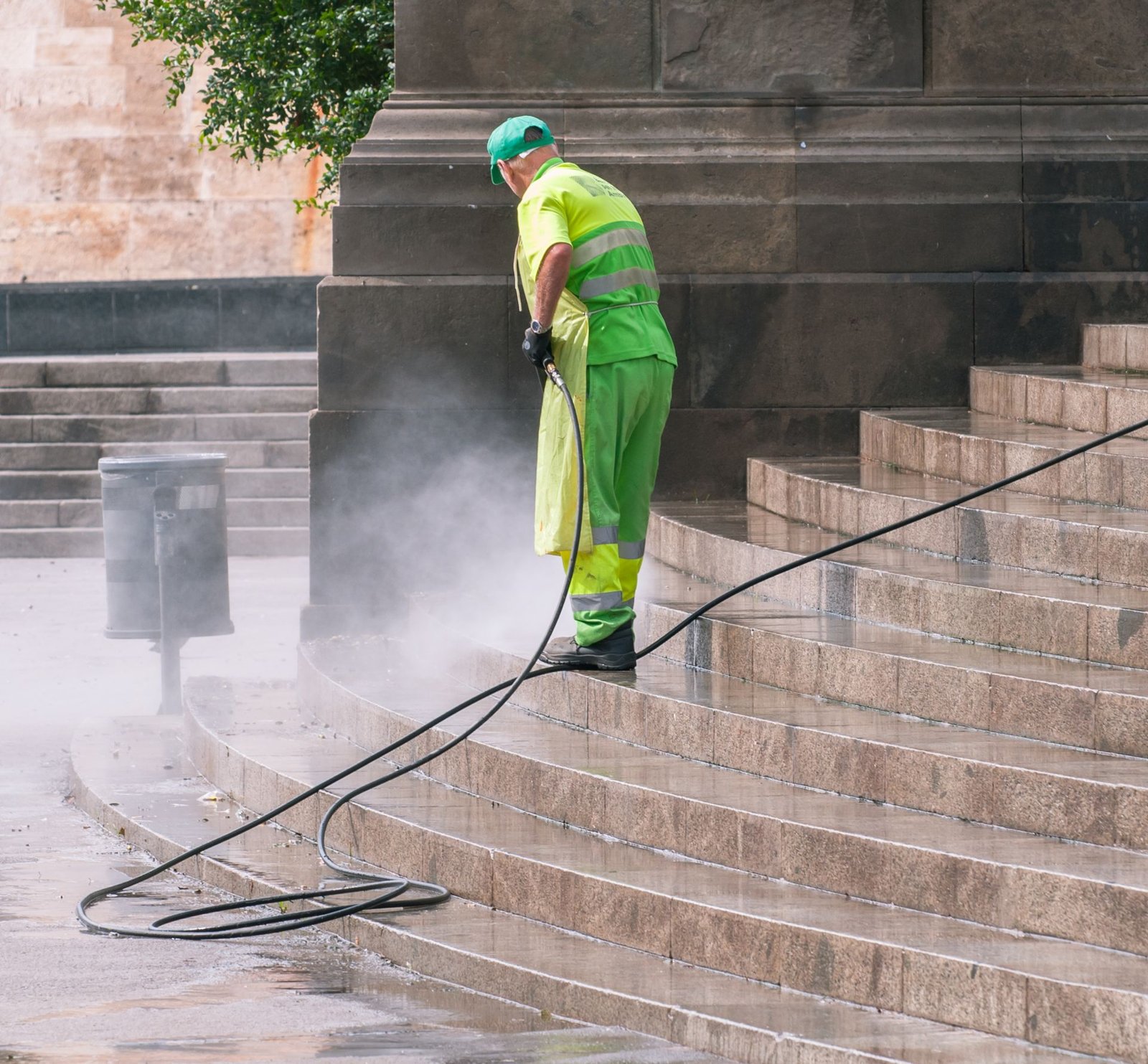 Algae and moss pressure washing removal on concrete surface, Jacksonville FL